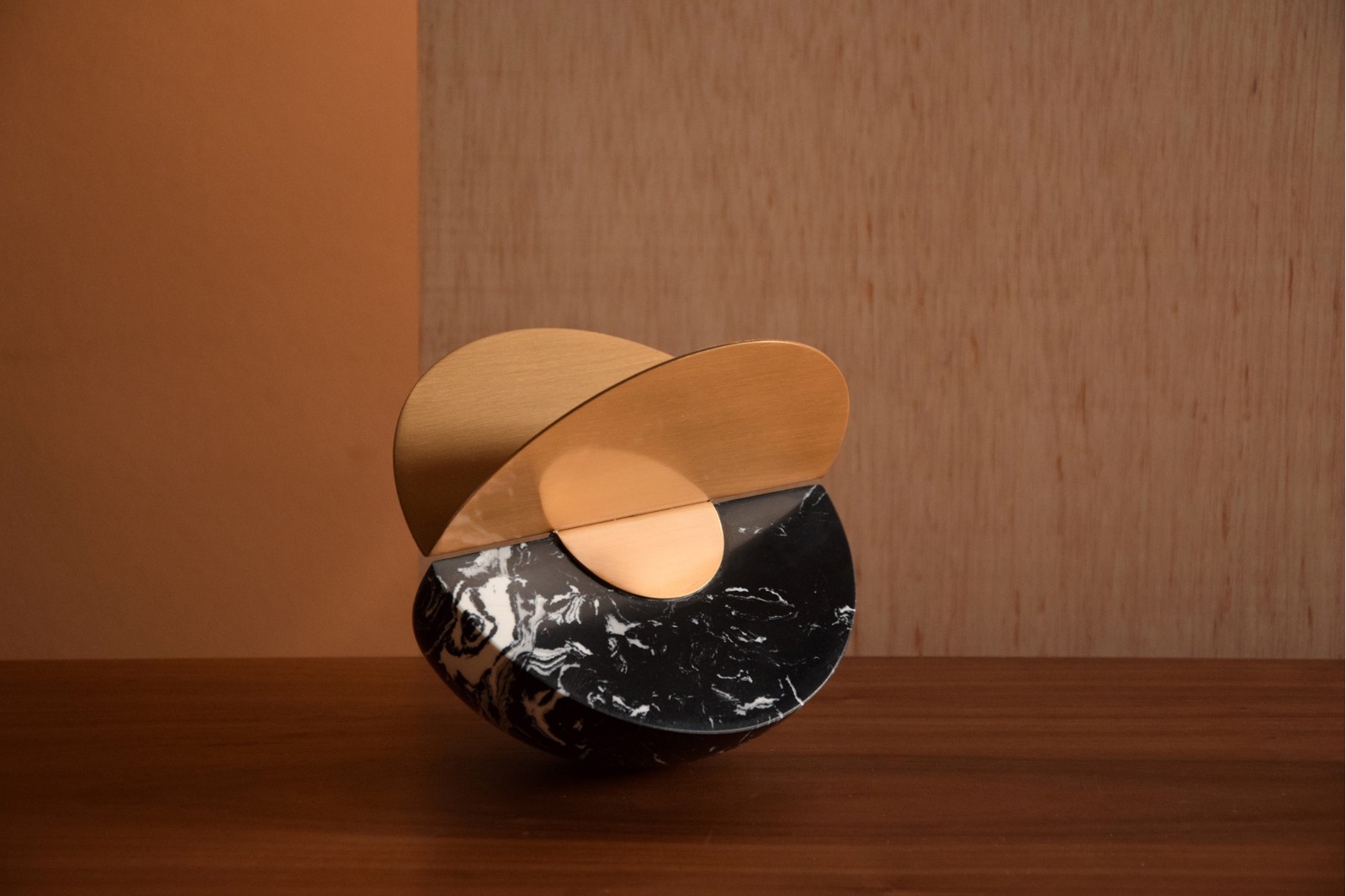SPHERE COLLECTION. BLACK MARBLE AND METAL SCULPTURE