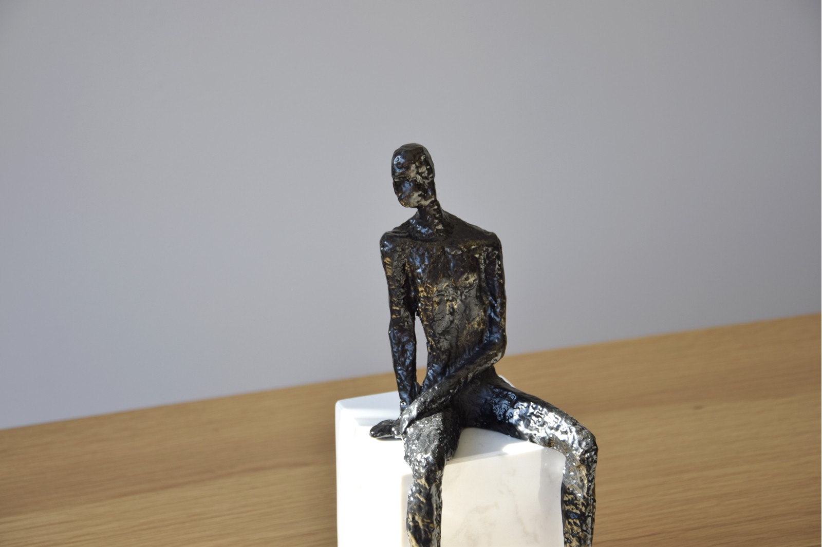 THINKING COLLECTION. METAL SCULPTURE ,WHITE MARBLE BASE