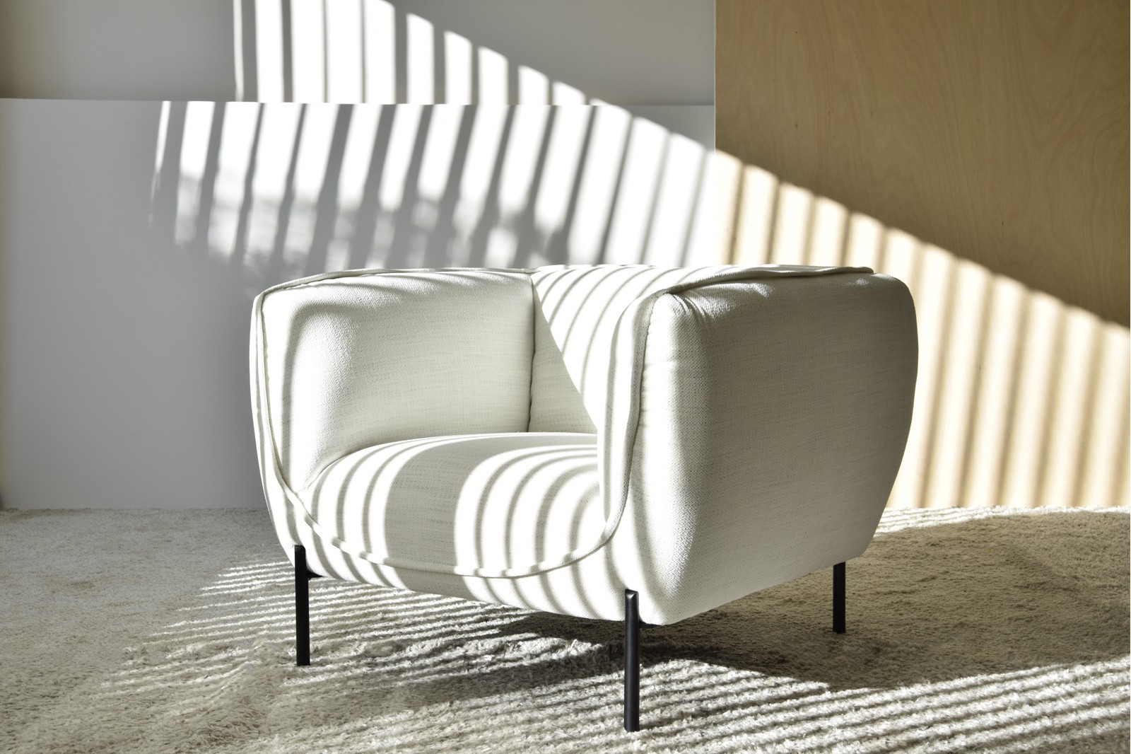 ARMCHAIR "FORMS". WHITE TONES UPHOLSTERY