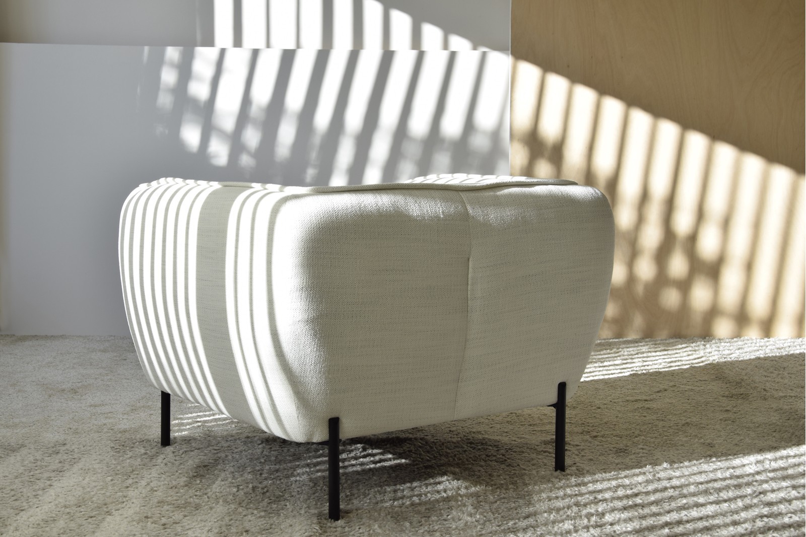 ARMCHAIR "FORMS". WHITE TONES UPHOLSTERY