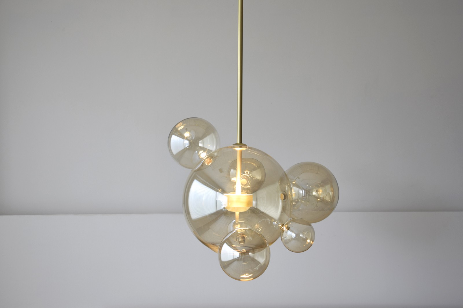 BUBBLE COLLECTION: CEILING LAMP. AMBER GLASS AND BRASS METAL