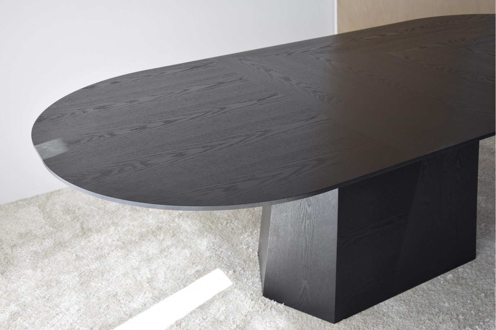 FACETS DINING TABLE. BLACK ASH