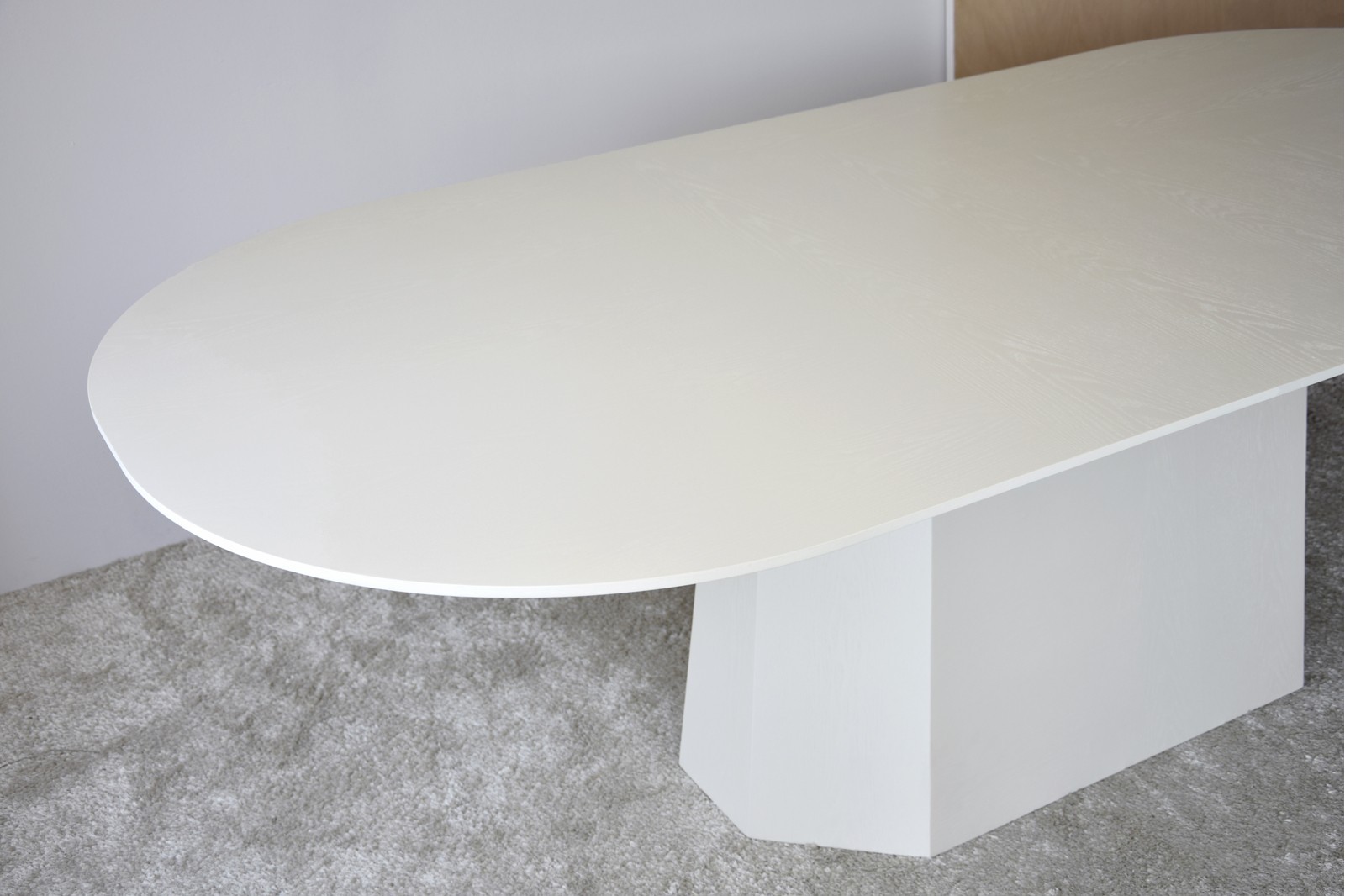FACETS DINING TABLE. WARM WHITE