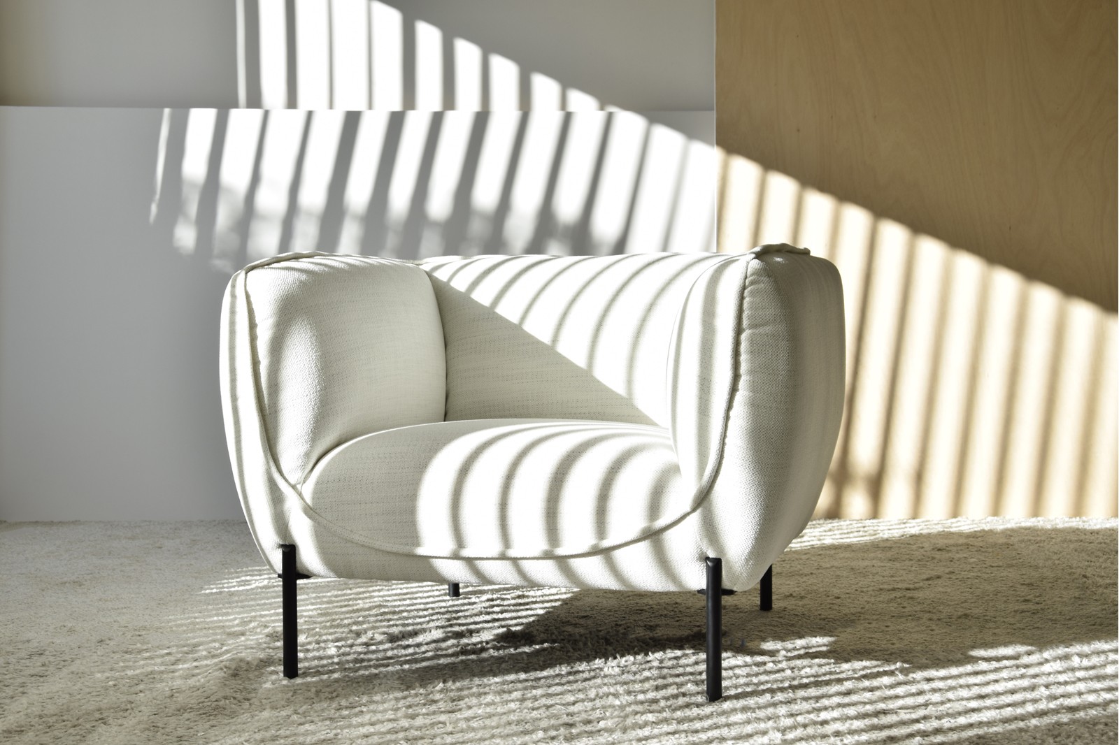 ARMCHAIR "FORMS". UPHOLSTERY IN WHITE TONES