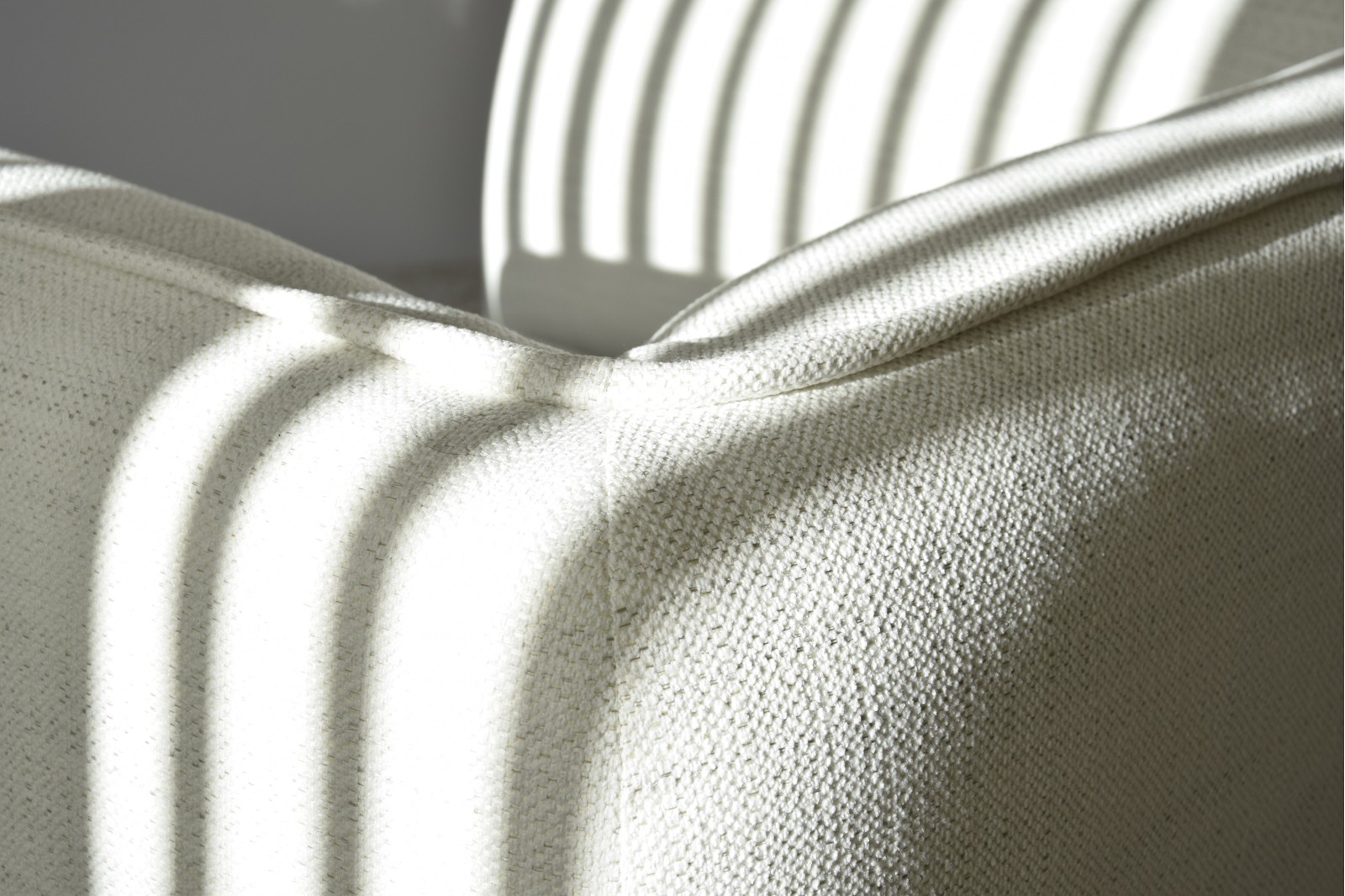 ARMCHAIR "FORMS". UPHOLSTERY IN WHITE TONES