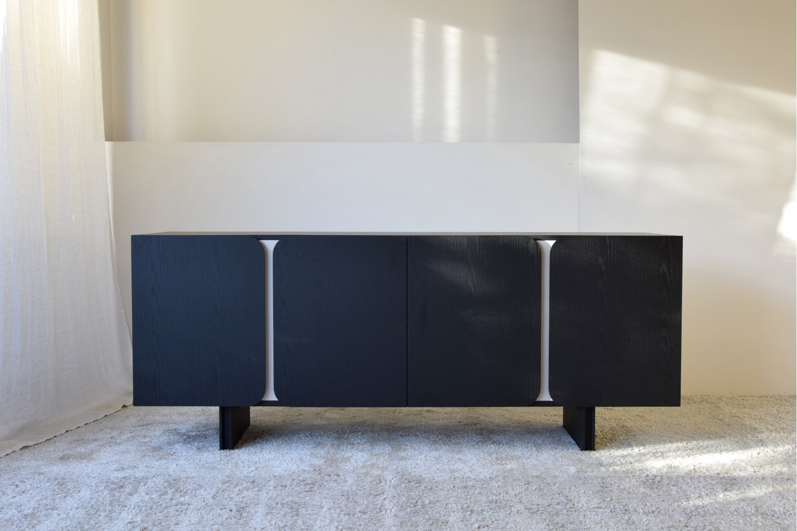 CURVE SIDEBOARD. BLACK OAK AND SAND GRAY