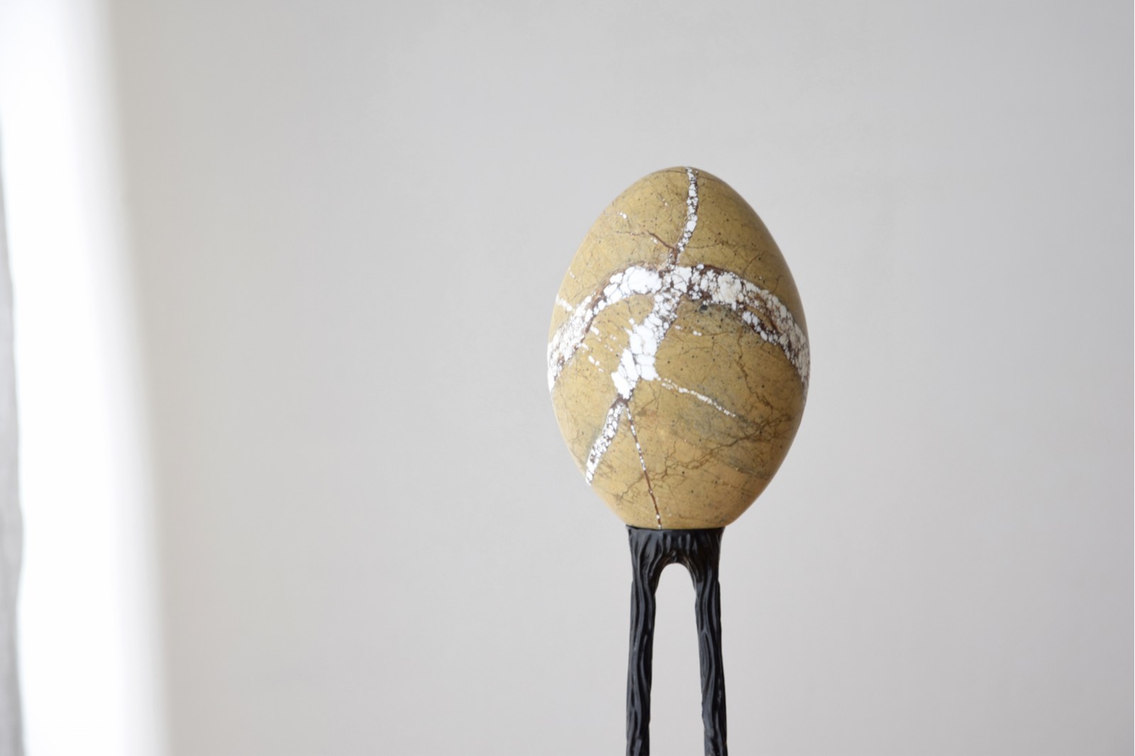 EGG COLLECTION: MARBLE AND METAL SCULPTURE