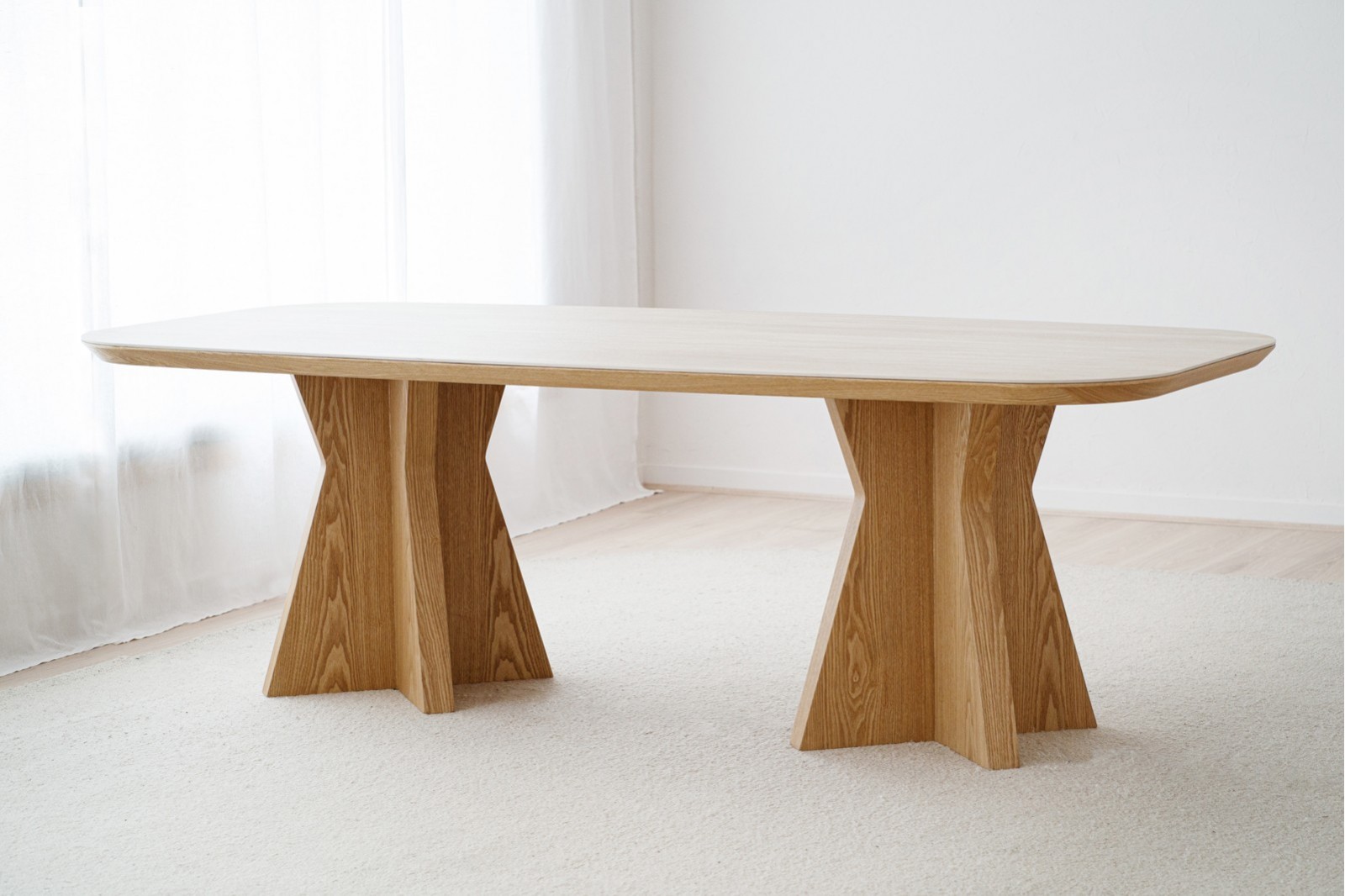 DINING TABLE LINE. MATT BEIGE CERAMIC AND ASH BASE