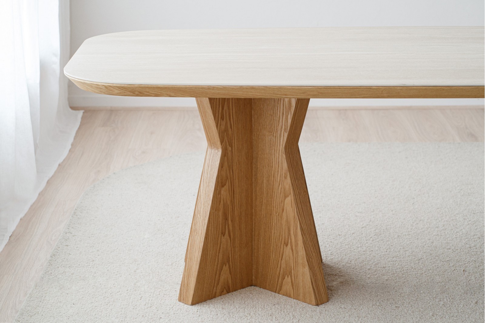 DINING TABLE LINE. MATT BEIGE CERAMIC AND ASH BASE