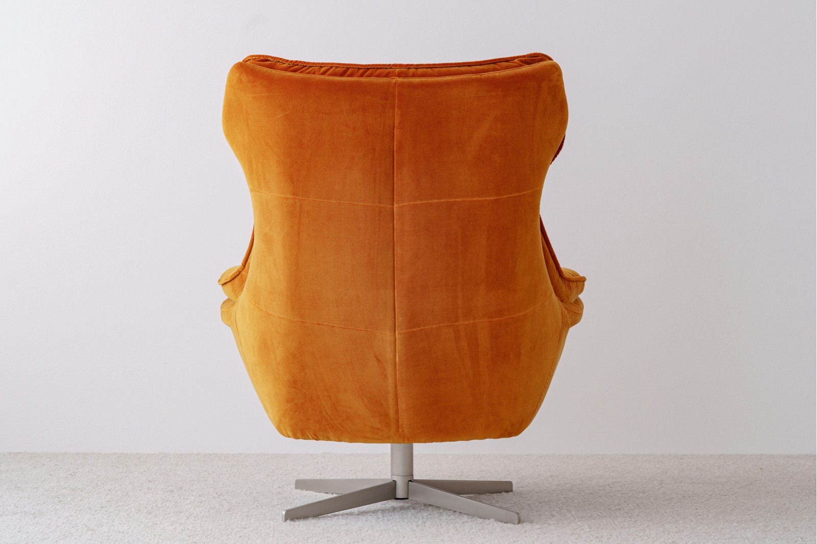 SWIVEL ARMCHAIR. ORANGE VELVET UPHOLSTERY