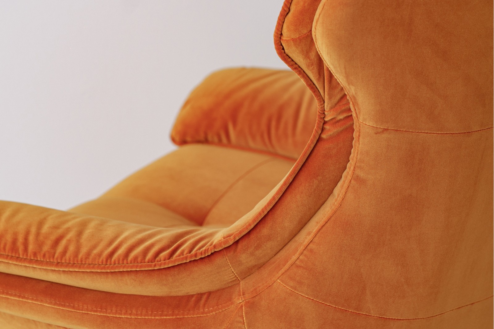 SWIVEL ARMCHAIR. ORANGE VELVET UPHOLSTERY