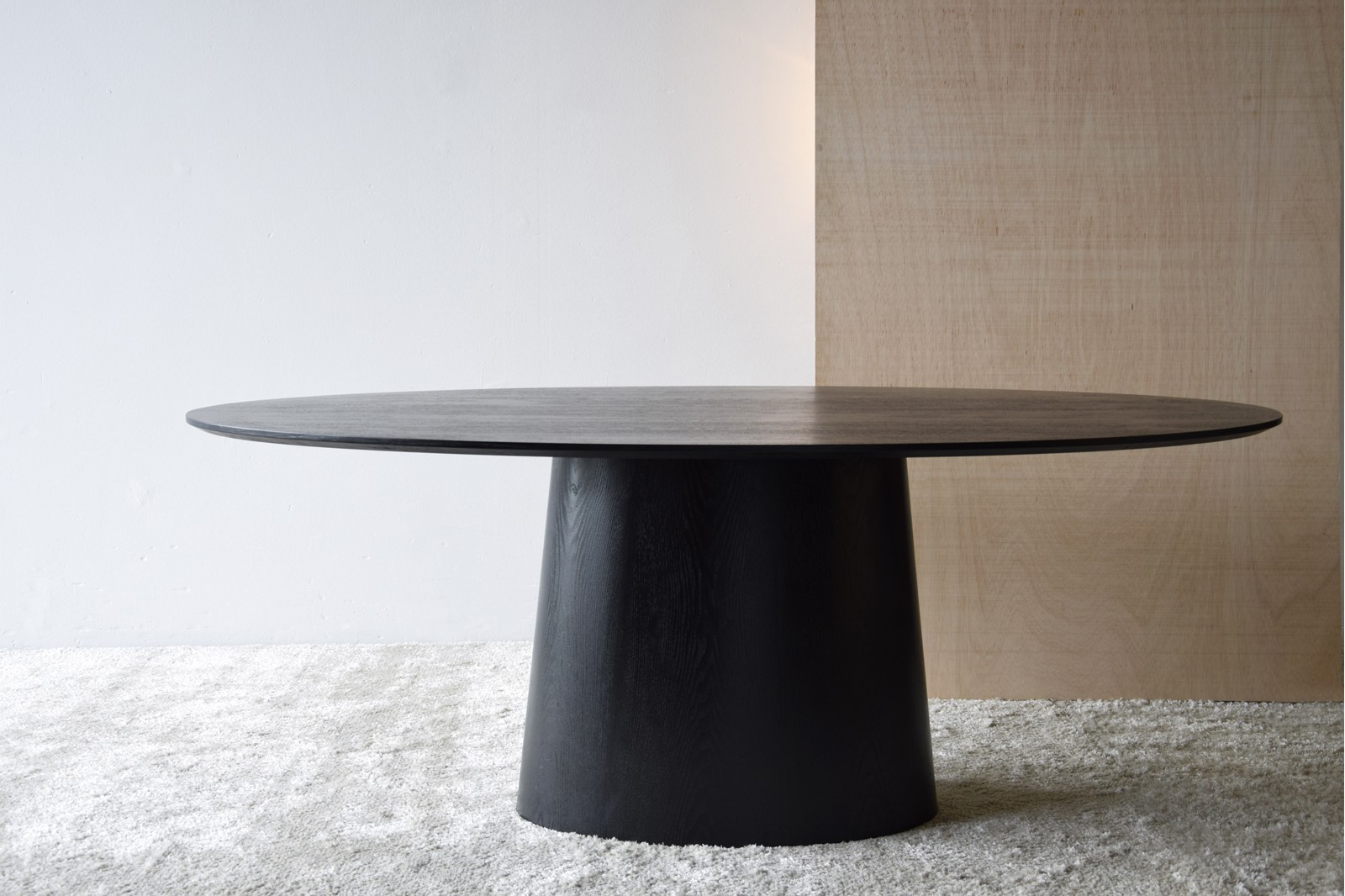 OVAL DINING TABLE. MATT BLACK ASH VENEER.