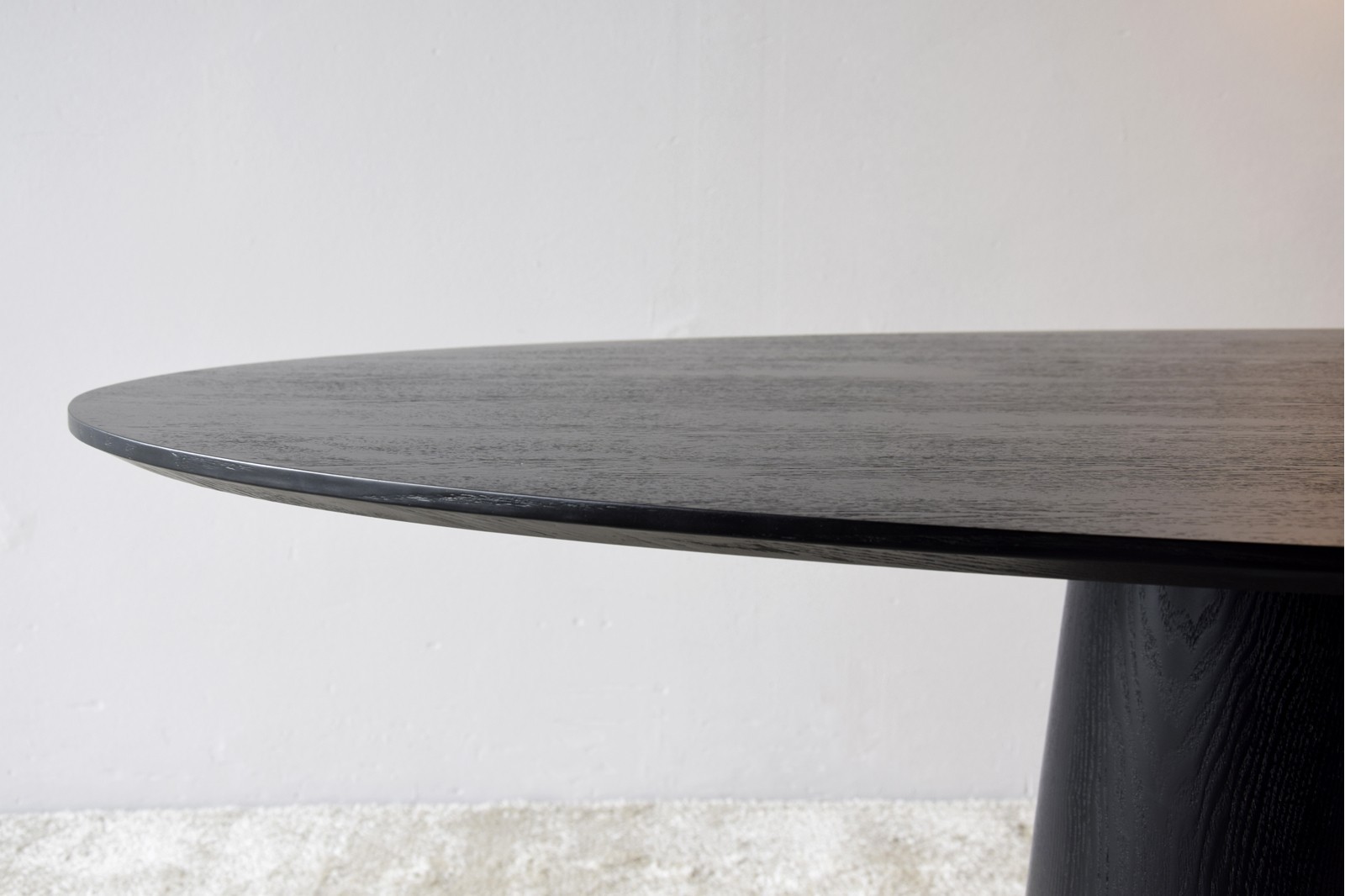 OVAL DINING TABLE. MATT BLACK ASH VENEER.