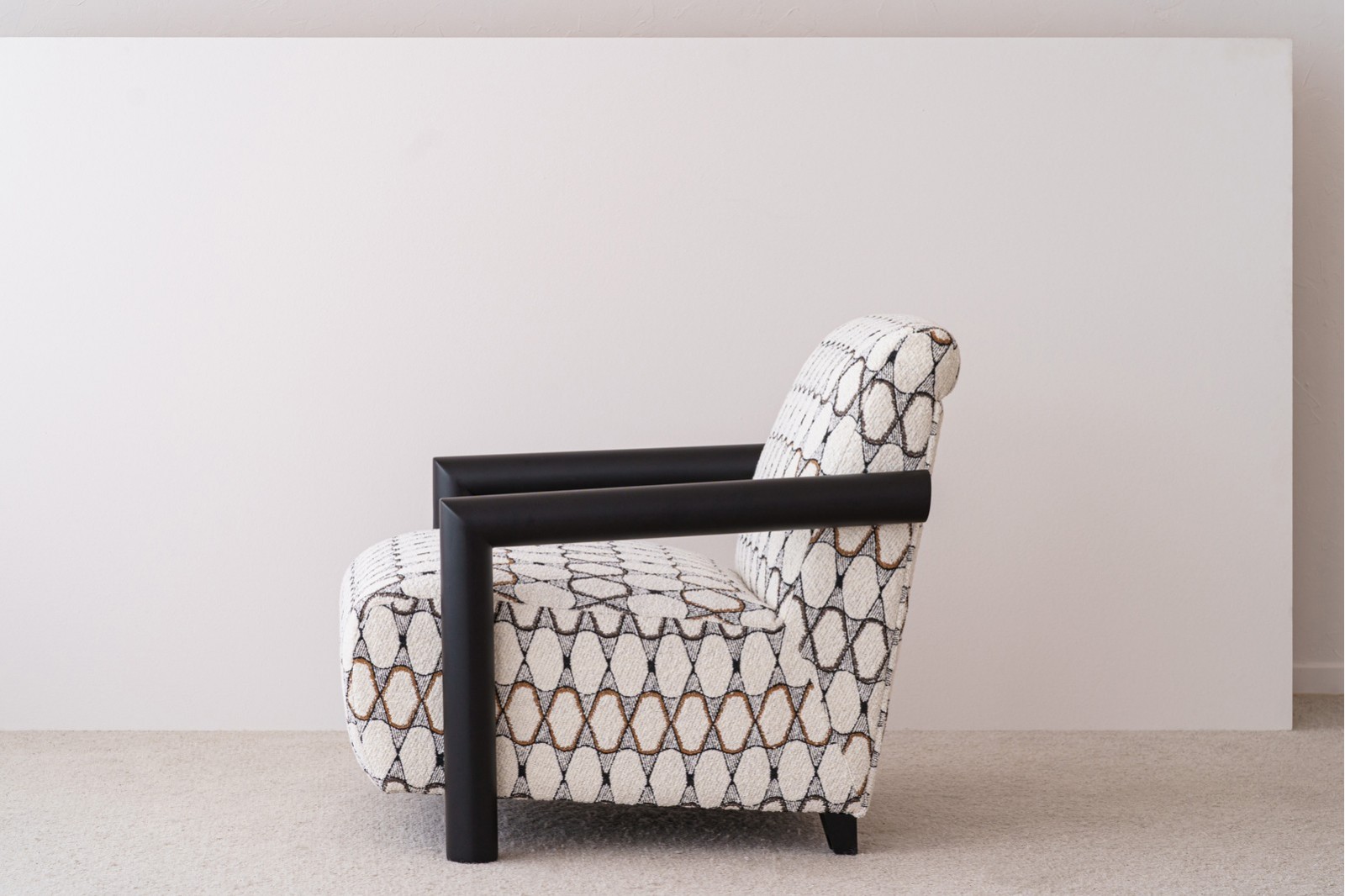 ARMCHAIR. GEOMETRIC BEIGE UPHOLSTERED.