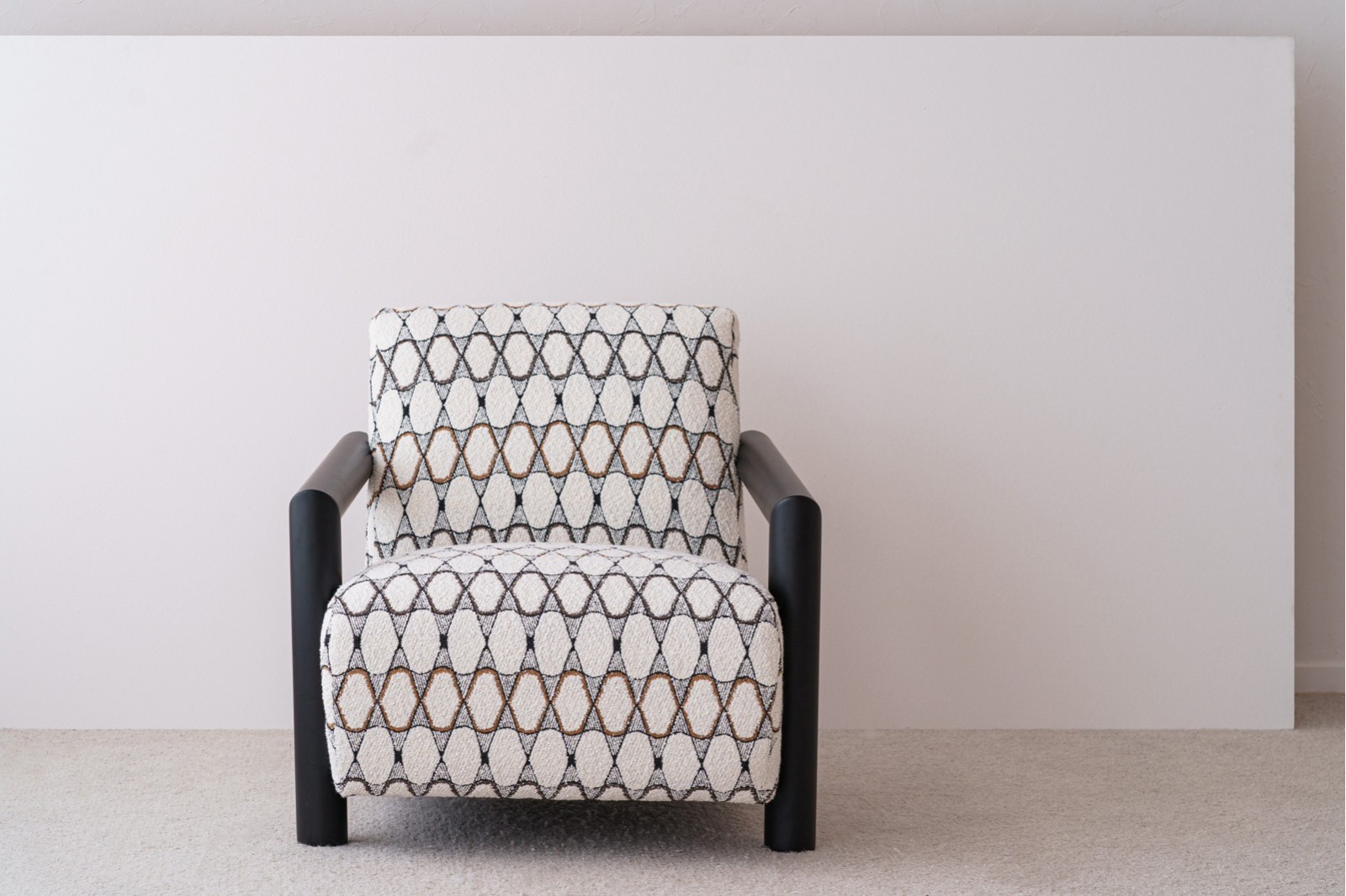 ARMCHAIR. GEOMETRIC BEIGE UPHOLSTERED.