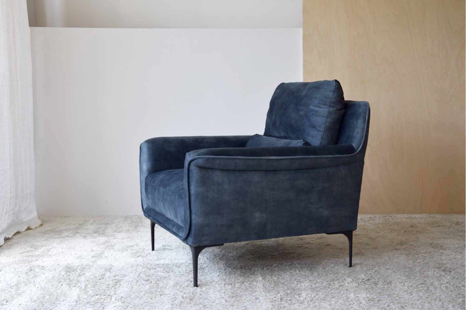 ARMCHAIR IN WORN BLUE VELVET