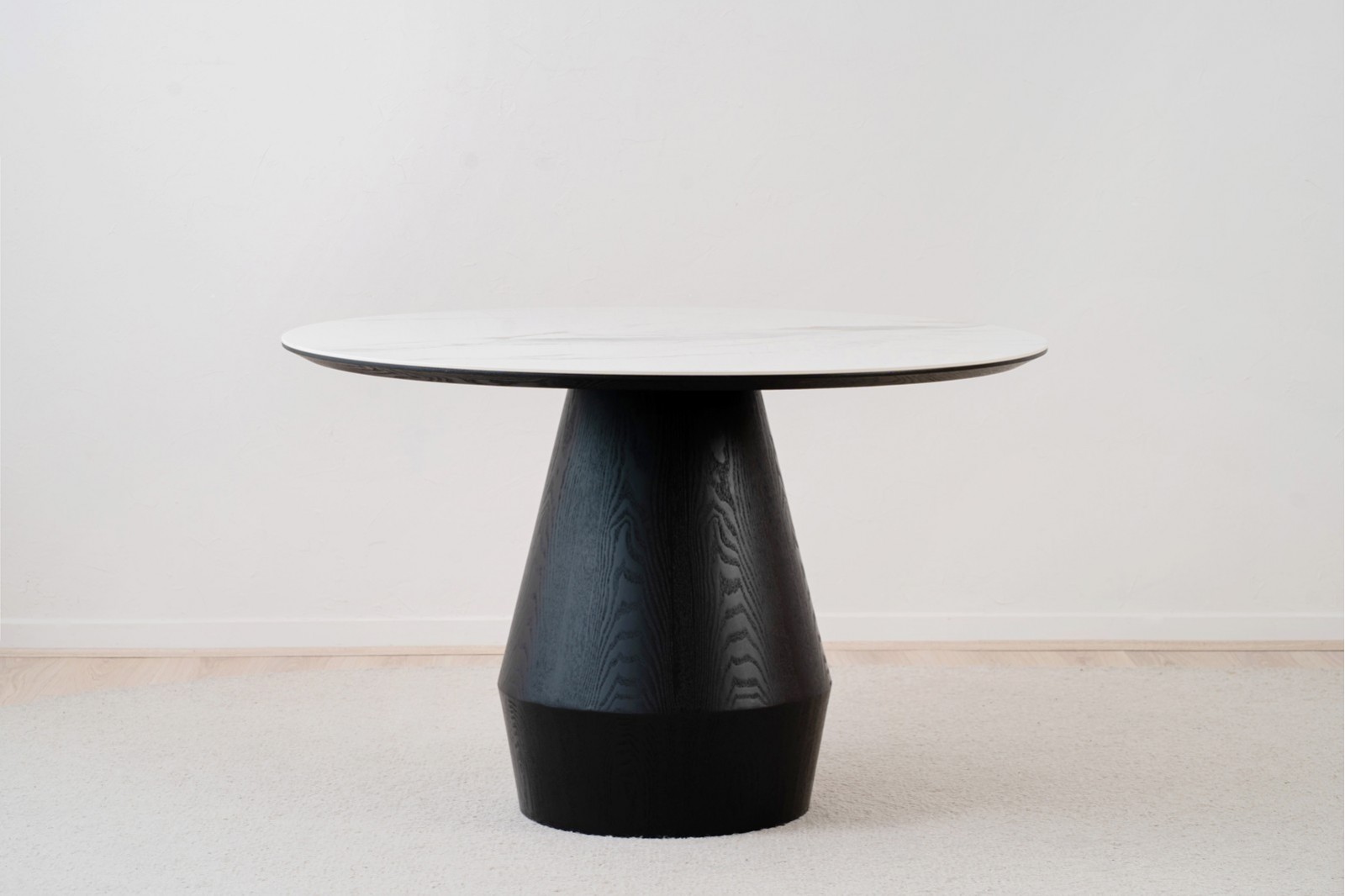 ROUND DINING TABLE. BLACK ASH AND CERAMIC