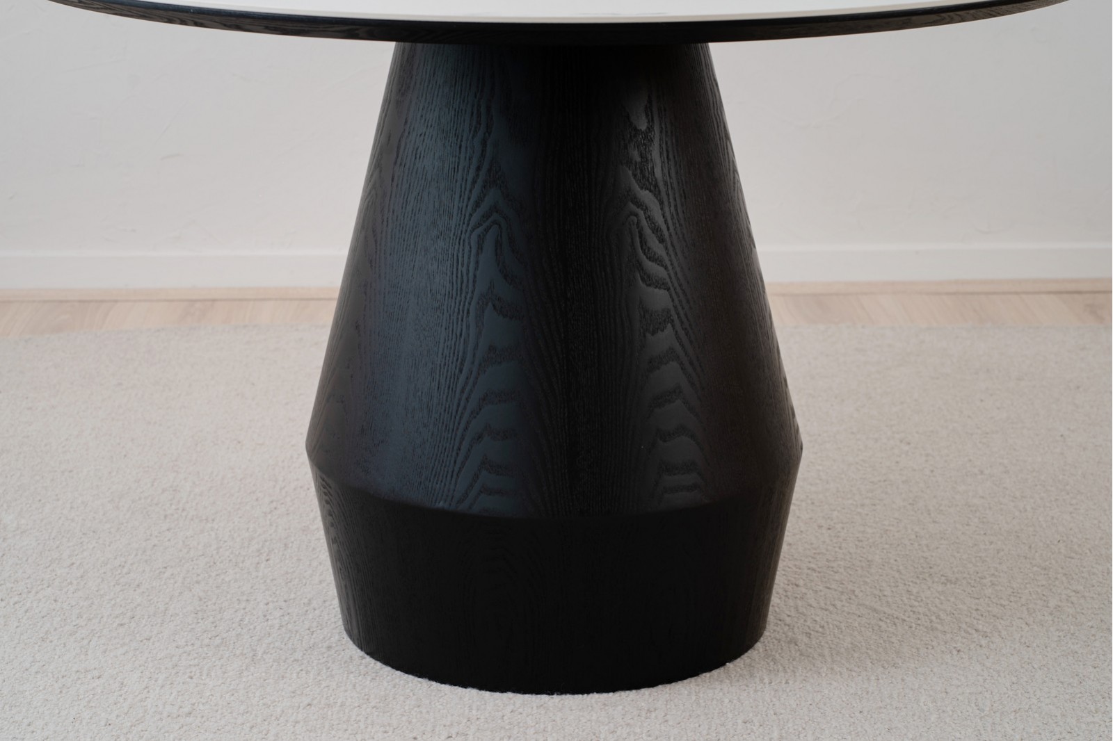 ROUND DINING TABLE. BLACK ASH AND CERAMIC
