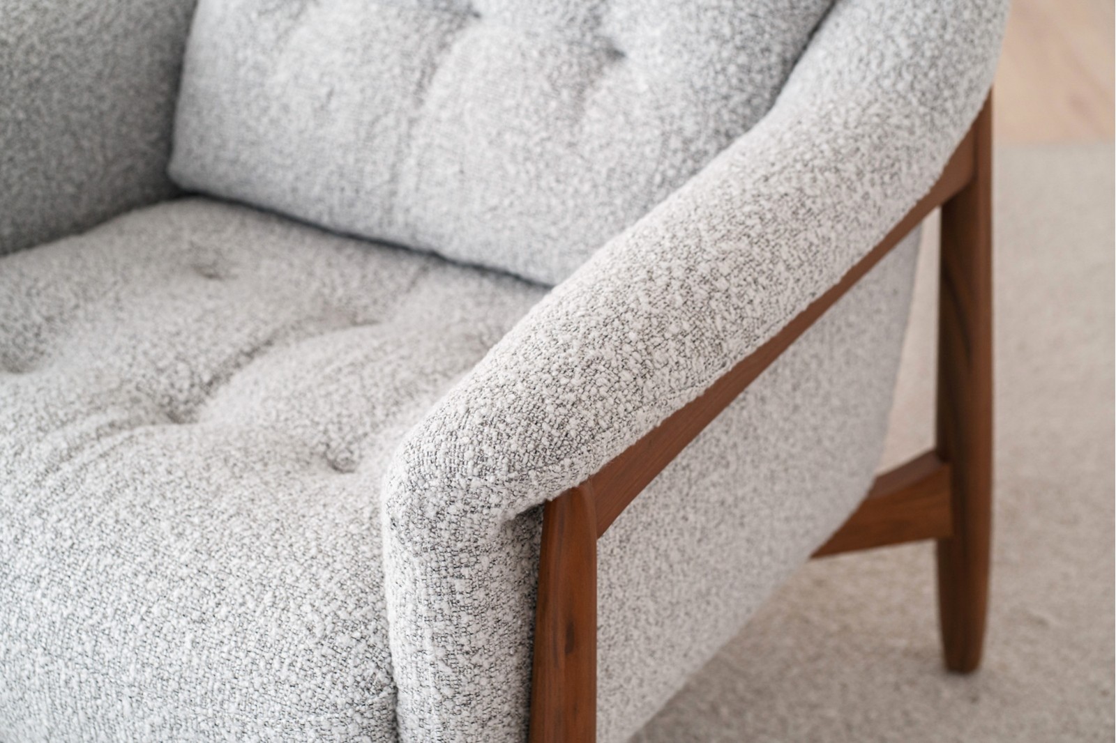 ARMCHAIR AND PUOF. WALNUT AND BOUCLE WHITE BLACK