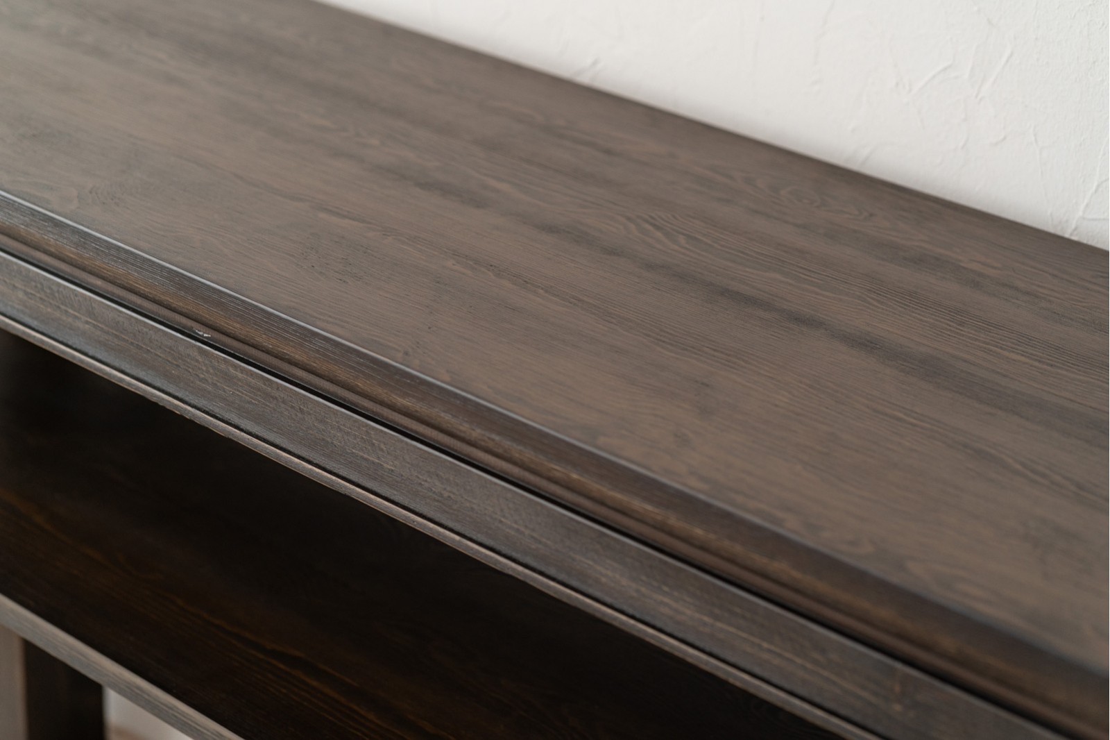IREA CONSOLE. DARK STAINED PINE