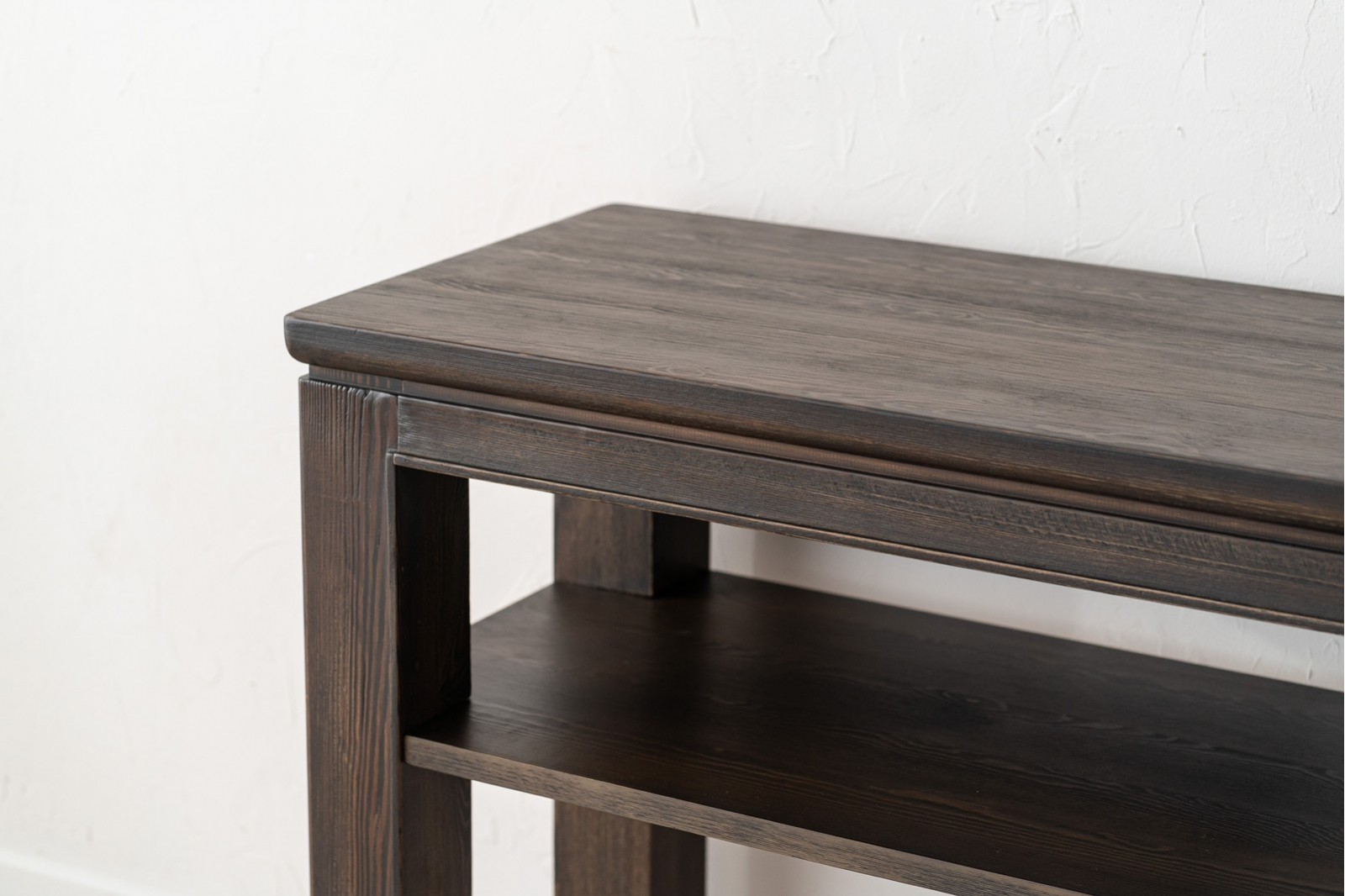 IREA CONSOLE. DARK STAINED PINE