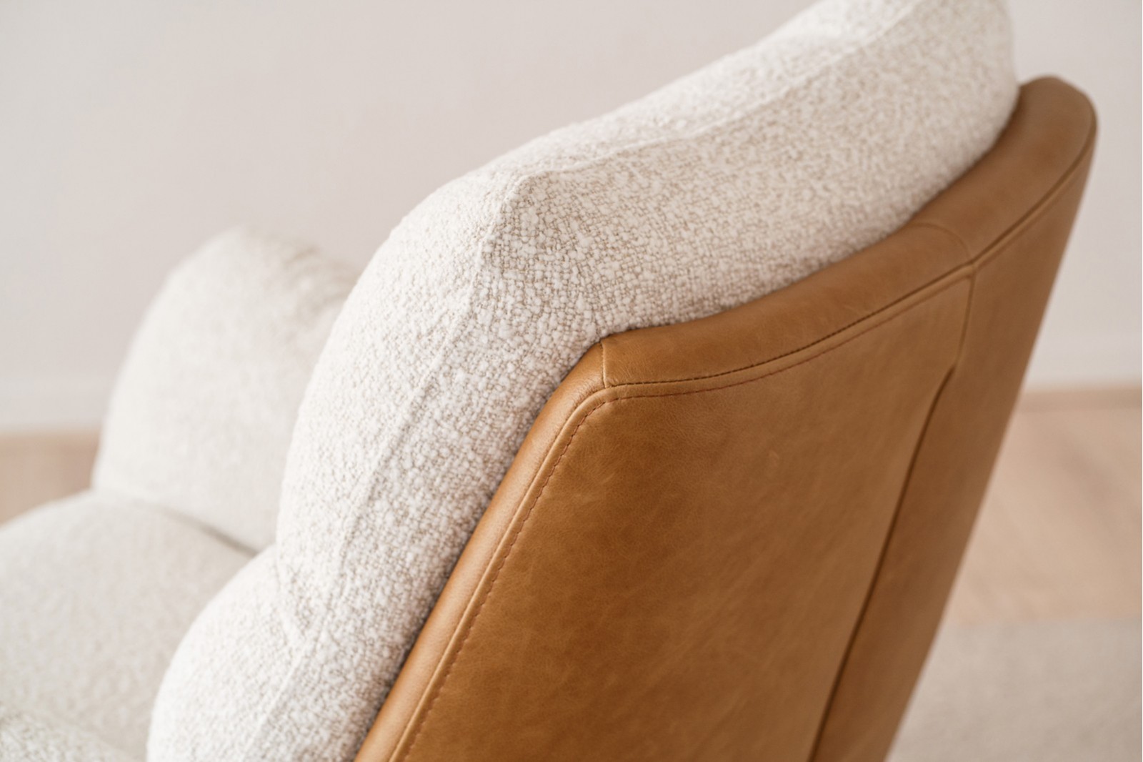 SWIVEL ARMCHAIR. LEATHER & BOUCLE FABRIC