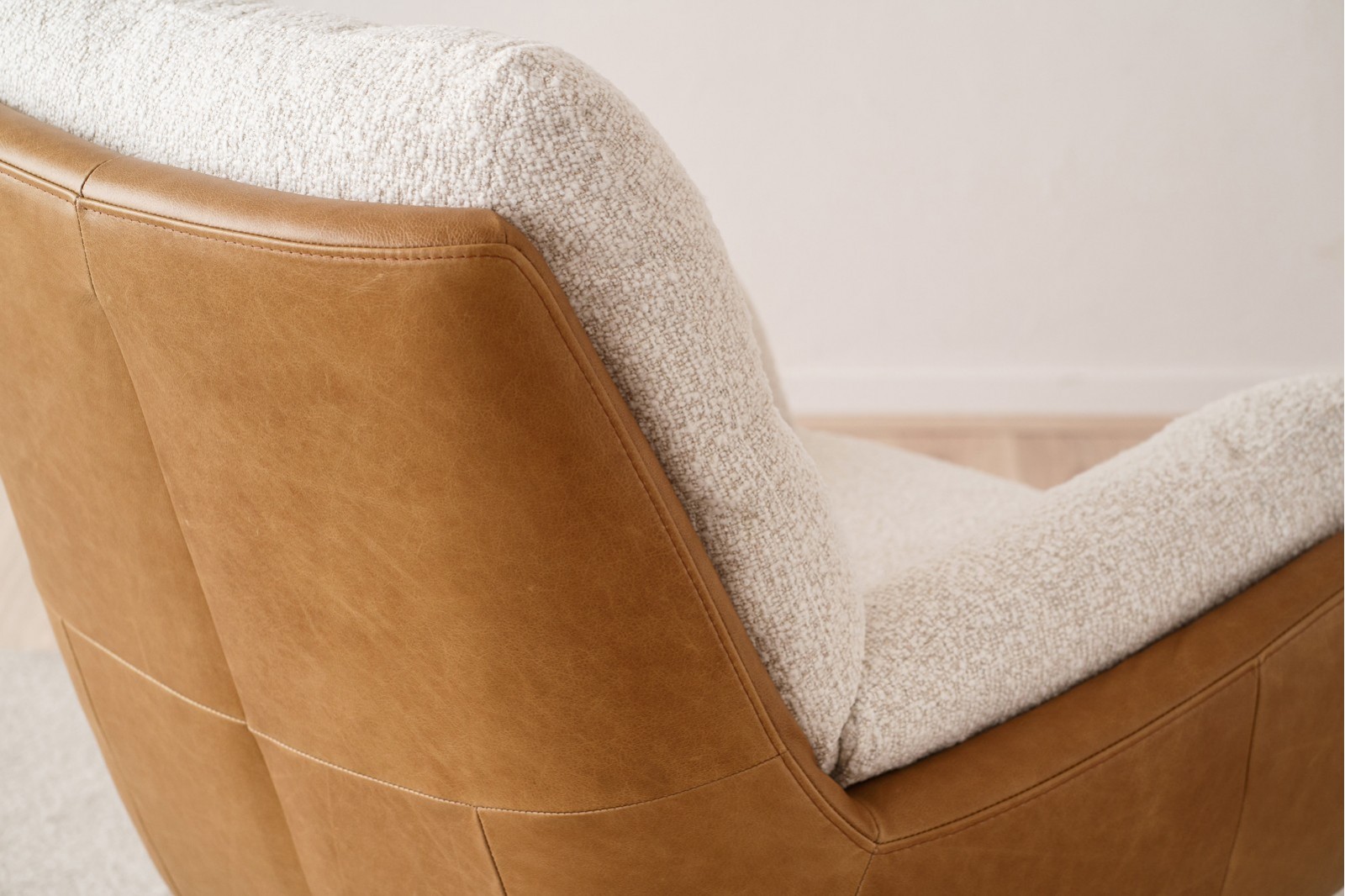 SWIVEL ARMCHAIR. LEATHER & BOUCLE FABRIC