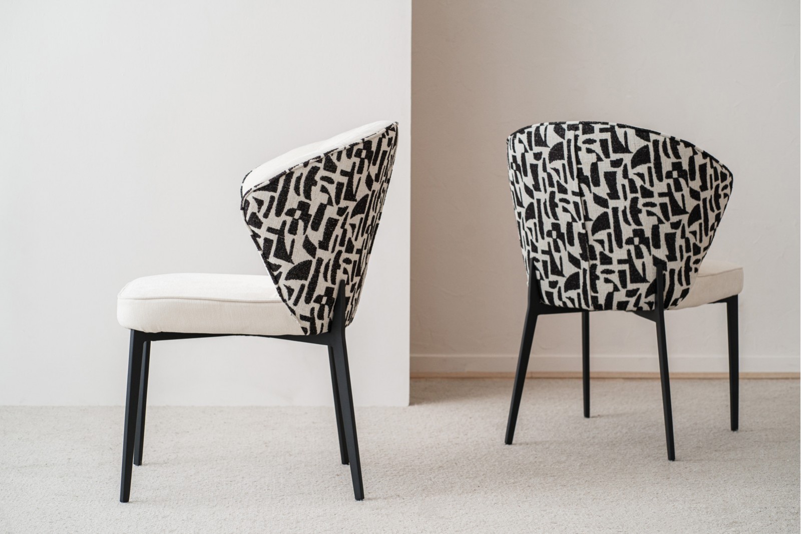 SET OF 2 EVA DINING CHAIRS. BLACK AND BEIGE