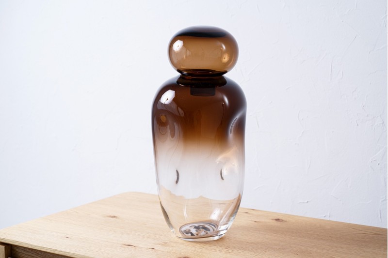 OMBA GLASS BOTTLE. BROWN AND TRANSPARENT